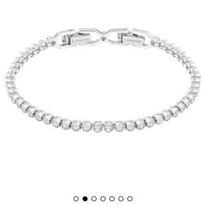 Swarovski “Emily” clasp bracelet. Round Cut, White, Rhodium Plated. 6 6/8” long